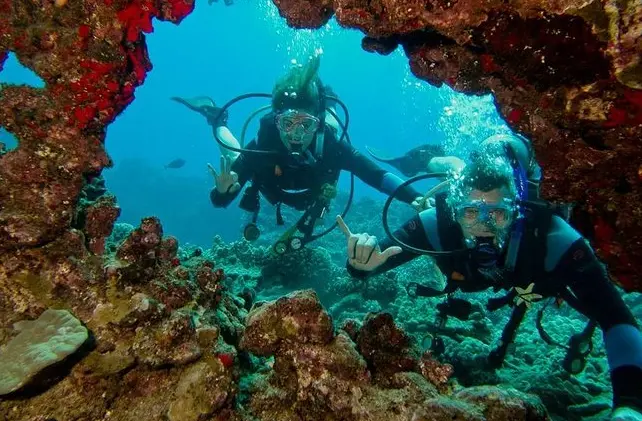 two scuba divers off Maui coast